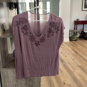 Medium Purple American eagle top with designs top.